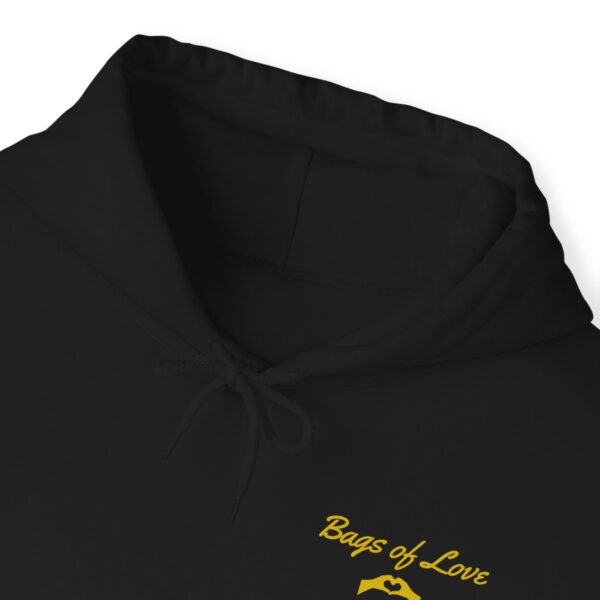 Close-up of BOL black sweatshirt folded.
