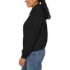 Side view of woman in BOL black sweatshirt.