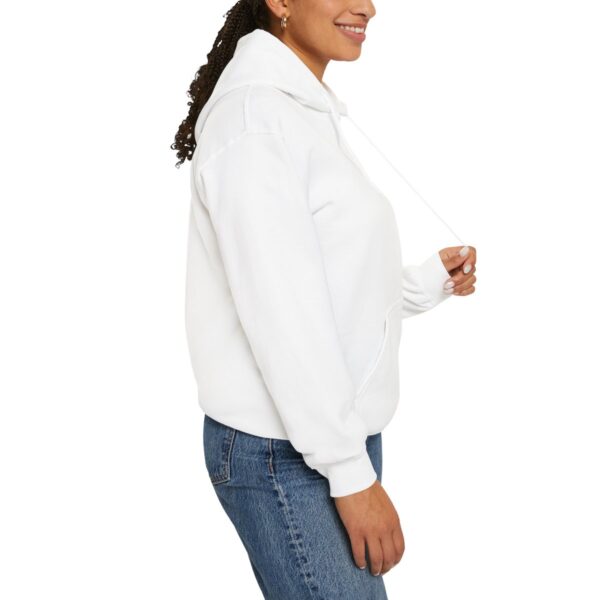 Side view of woman in BOL white sweatshirt.