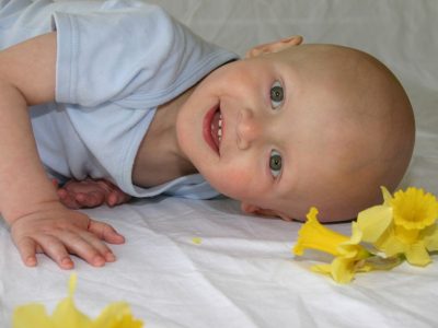 Young cancer patient smiling.